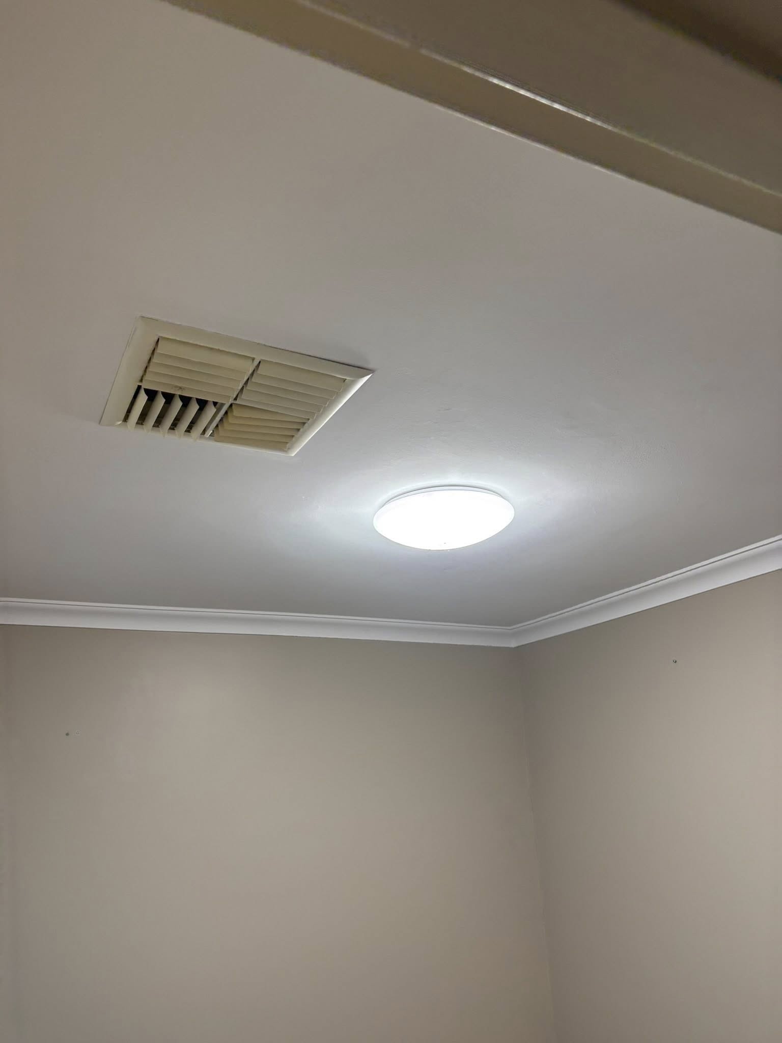 Ceiling repaired and repainted smooth white
