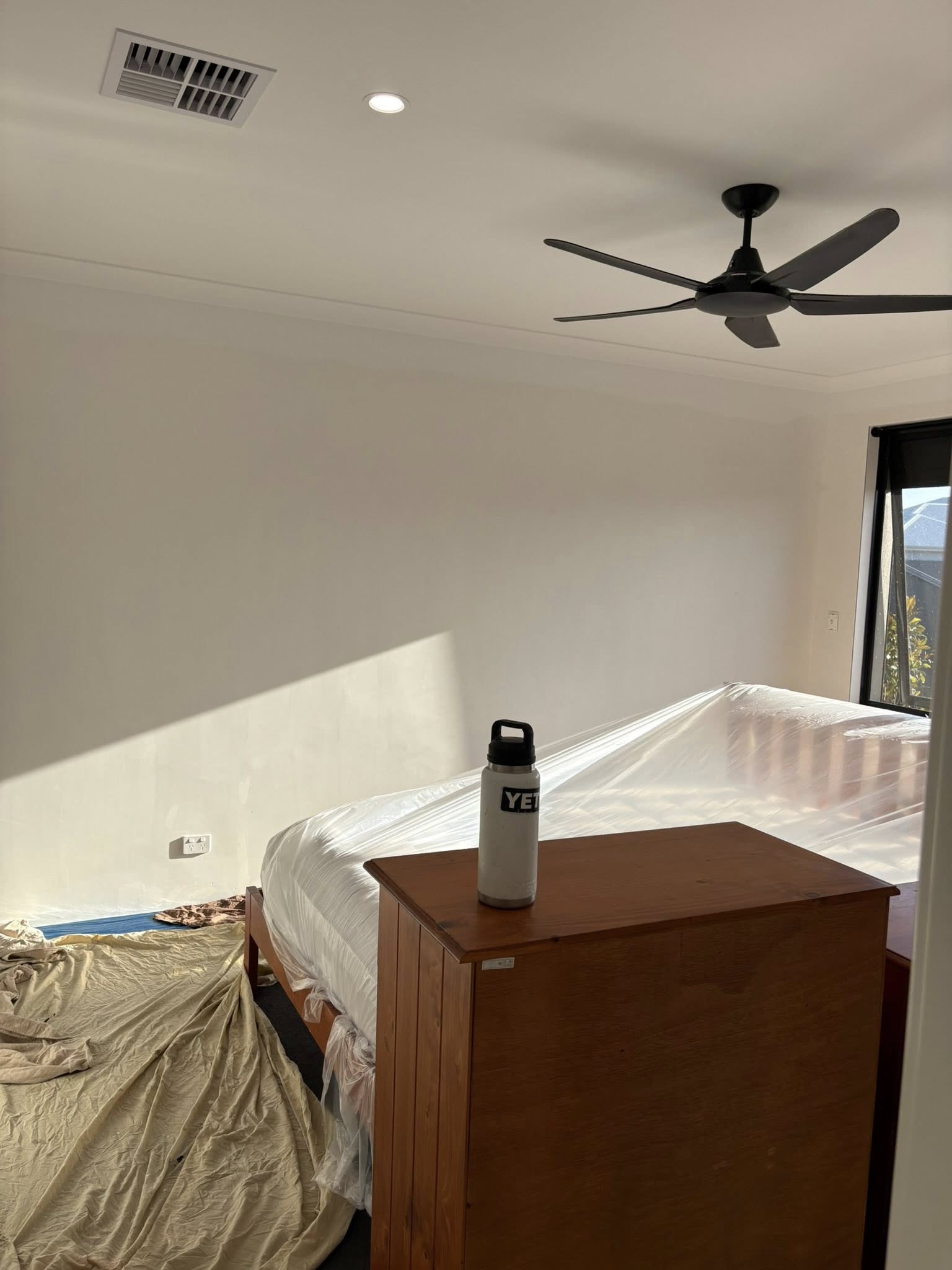 Master bedroom walls before adding feature colour